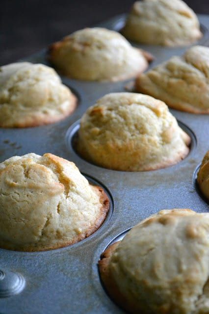 freshly baked muffins in a baking pan ready to go into the oven