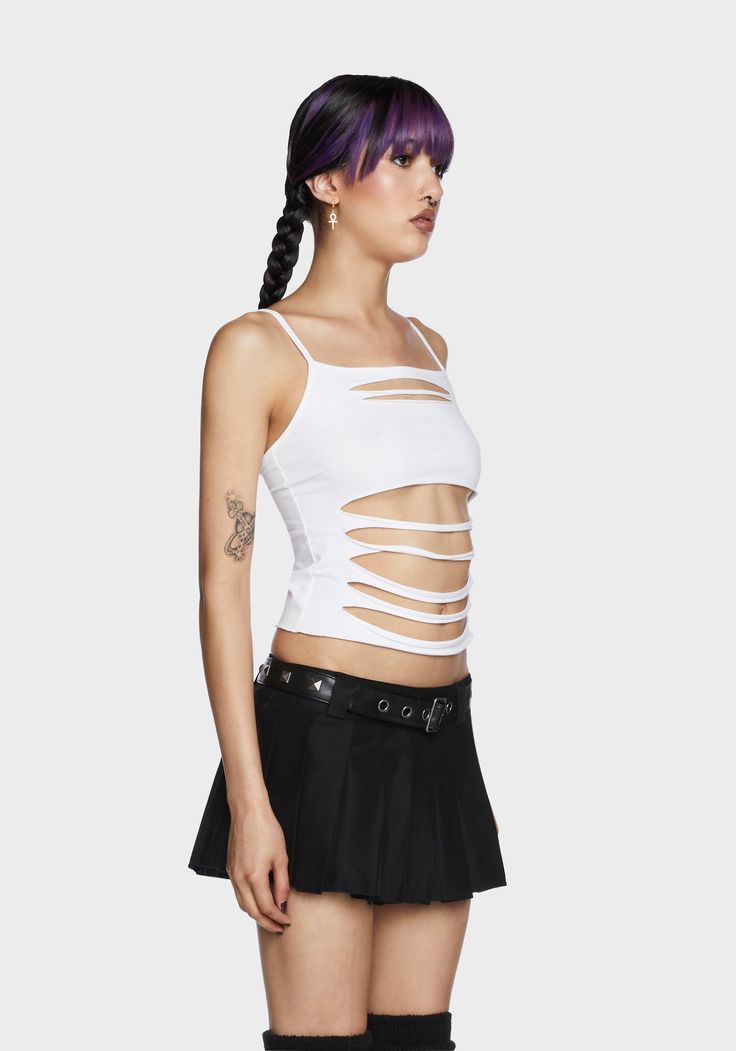 cuz you were born to be wild! This cropped tank top has a stretchy jersey construction, slashed cutouts at front, a square neckline, and adjustable shoulder straps. Y2k White Crop Top For Night Out, Y2k Crop Top With Tank Straps For Summer, Edgy Stretch Crop Top With Tank Straps, Y2k Crop Top With Adjustable Straps For Summer, Y2k Style Summer Crop Top With Adjustable Straps, Edgy White Crop Top, White Stretch Edgy Crop Top, Edgy Tank Crop Top For Spring, Edgy White Stretch Crop Top