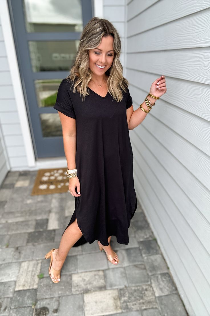 Wait until you feel how buttery soft this maxi dress is. Features a v-neckline, side slits and pockets. Model is 5'3" wearing a small 94% poly 6% Spandex hand wash or dry clean made in the USA! Casual V-neck Everyday Dress, Casual Everyday V-neck Dress, Black V-neck Midi Dress With Side Slits, Solid V-neck Dresses With Side Slits, Black V-neck Maxi Dress With Side Slits, Casual V-neck Dress For Everyday, V-neck Loungewear Dress With Side Slits, Black V-neck Midi Dress For Loungewear, Everyday V-neck Summer Dresses