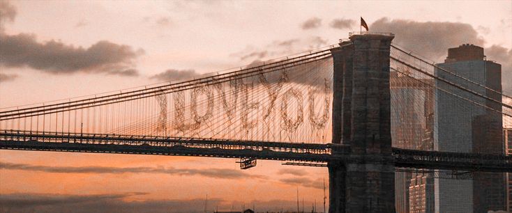 an image of the brooklyn bridge at sunset