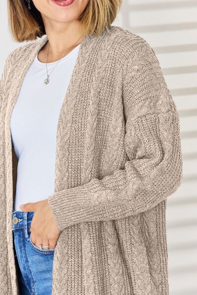 Stay on top of your style game with the Vanessa Cable-Knit Open Front Cardigan! This playful top is the perfect addition to your wardrobe, offering a quirky and fun twist on the classic cable-knit design. With its open front and cozy feel, this cardigan is sure to keep you looking stylish and feeling comfortable all day long. Features: Basic style Stretch: Moderate stretch Material composition: 100% polyester Care instructions: Machine wash cold. Tumble dry low. Imported Product measurements:S:B Versatile Cardigan, Pink Plaid Shirt, Shoulder Cardigan, Drop Shoulder Cardigan, Blue Zone, Maxi Skirt Outfits, Printed Wide Leg Pants, Argyle Sweater, Round Neck Sweaters