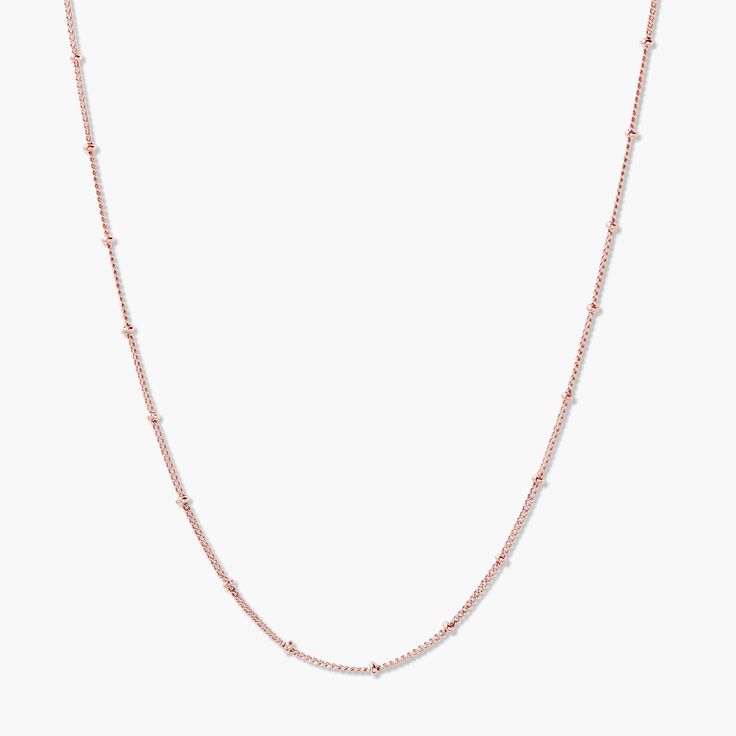 A simple, delicate beauty makes the Madeline Necklace an ideal addition of jewelry to your collection. Available in a 14k gold, silver, or rose gold finish, this beauty is as sleek as it is stylish. Perfect on its own or pair it with another necklace to create a new fabulous look. A timeless necklace that is a favorite with women of all ages. Available in 14k gold plated, rhodium plated or 14k rose gold plated brass 16" satellite chain with 2" extender Lobster claw closure Protected with an anti Rose Gold Sterling Silver Tarnish Resistant Chain Necklace, Elegant Rose Gold Necklace For Everyday Wear, Elegant Rose Gold Necklace For Everyday, Feminine Rose Gold Necklace With Clavicle Chain, Feminine Rose Gold Necklaces With Clavicle Chain, Elegant Rose Gold Cable Chain Necklaces, Chic Adjustable Rose Gold Chain Necklace, Elegant Rose Gold Necklace With Cable Chain, Chic Rose Gold Clavicle Chain Necklace