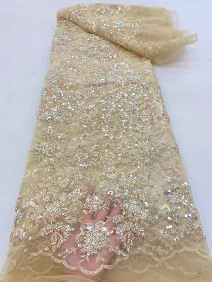 This high quality Fabric is measured in 5 Yards With Embroidered Beading and Sequin. It is soft, very delicate and beautiful. This high Quality Fabric is made with Fashion embroidered rhinestones can be used in making party wedding dresses, skirts, shawls, scarves and other other fashion apparels as you would like. Size : Length : 5 yards (180 inch). Width: 50 inch (Please allow slight deviation for the measurement data ,±1 inch) Material: 100% Polyester, Tulle Lace Fabric, Eco-Friendly embroide Elegant Sparkling Tulle Fabric For Wedding, Elegant Organza Embroidered Fabric For Banquets, Elegant Embroidered Organza Fabric For Banquet, Elegant Organza Embroidered Fabric For Banquet, Glamorous Organza Sequin Fabric For Wedding, Glamorous Wedding Sequin Organza Fabric, Elegant Lace Dress With Rhinestones, Wedding Tulle Lace Fabric With Rhinestones, Wedding Lace Tulle Fabric With Rhinestones