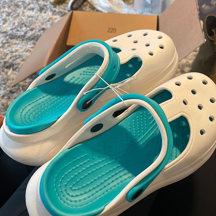 Never Worn White Clog Slides. Size 8 White Slide Clogs For Summer, White Summer Slide Clogs, White Platform Clogs For The Beach, Casual White Slip-on Mules, White Flat Clogs For Beach, White Flat Clogs For The Beach, White Flat Clogs For Summer, White Slide Clogs For The Beach, Spring Casual Slide Clogs