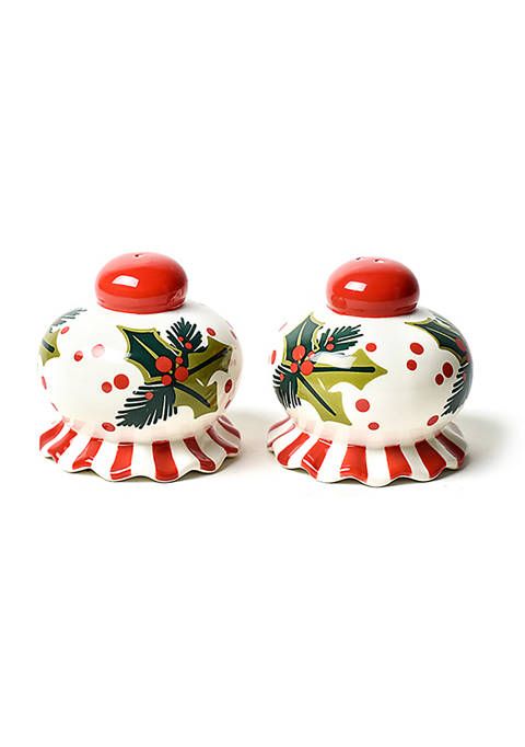 two ceramic salt and pepper shakers with holly designs