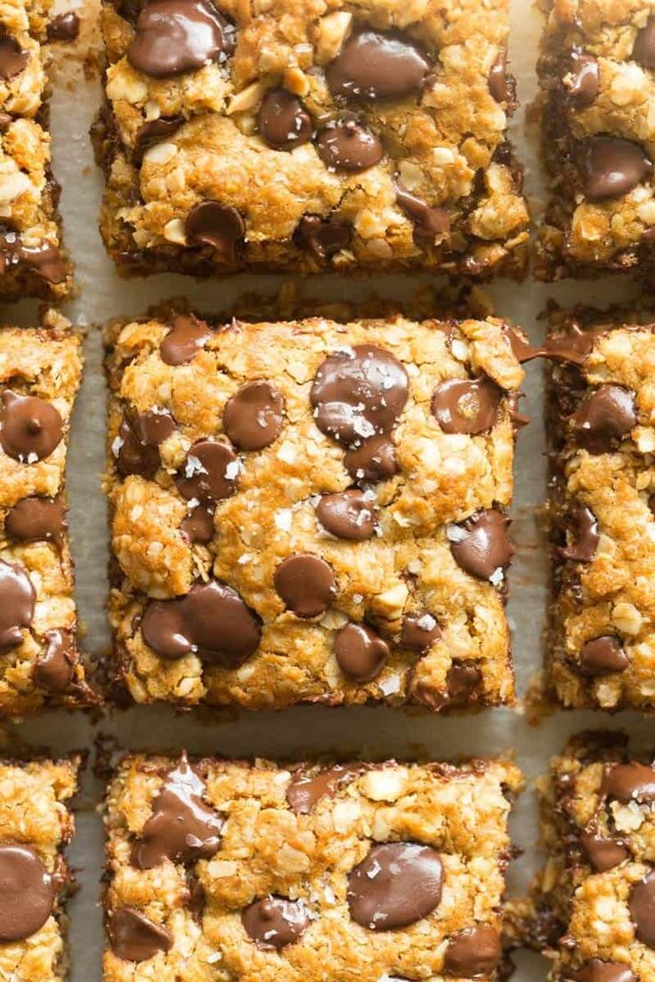 chocolate chip cookie bars cut into squares on a baking sheet