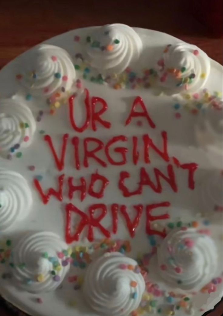 a birthday cake with the words ur a virgin who can't drive written on it