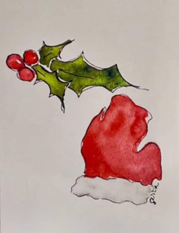 a drawing of a santa hat and holly berry on a white paper with watercolor pencils