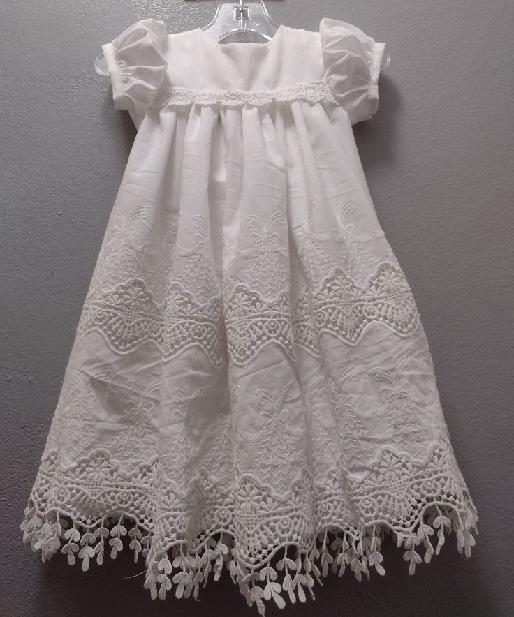 Edna is our newest lace infant christening, blessing, baptism dress. Edna measures approximately 20 inches in length. You can add length to Edna to make her longer if you like. See the link for added length below this description. This baby girl lace dress is made of the most extraordinary cotton lace. Edna has a high yoke design. This infant lace dress has short puffed sleeves. Edna has 2 buttons in the back opening for easy dressing. Edna is made of milk white cotton and completely lined. Perf First Communion Spring Dress With Lace Trim, Lace Dress With Lace Trim For First Communion, Spring First Communion Dress With Ruffles, White Ruffled Lace Dress For First Communion, White Lace Dress For Baptism In Spring, White Lace Dress With Ruffles For First Communion, White Lace Dress For Spring Baptism, Elegant Spring Baptism Dress With Broderie Anglaise, Elegant Broderie Anglaise Baptism Dress For Spring