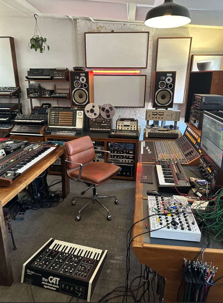 a room filled with lots of musical equipment