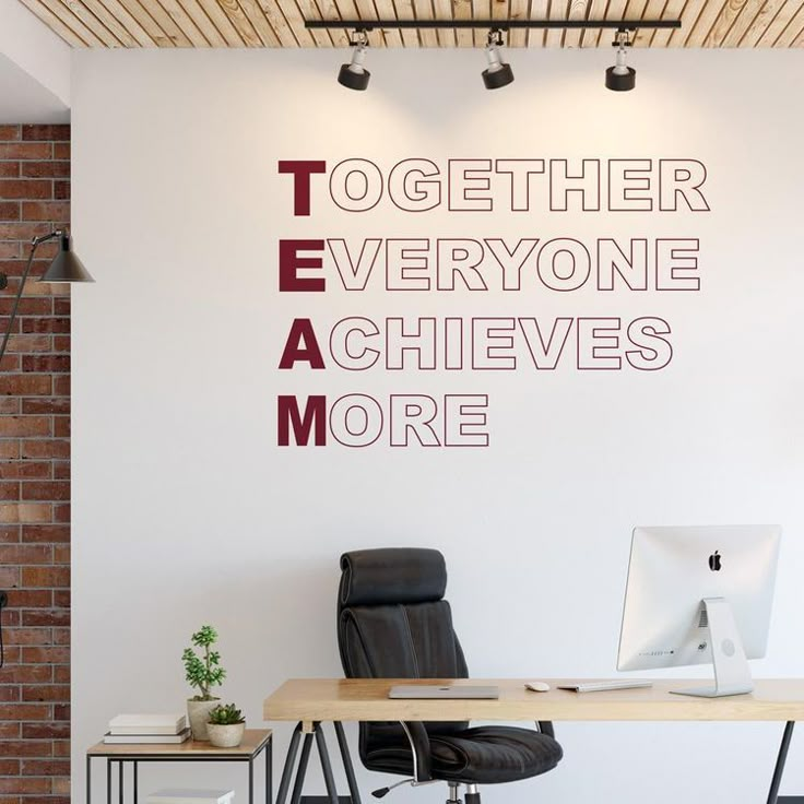 there is a wall decal that says together everyone achieves more on the wall