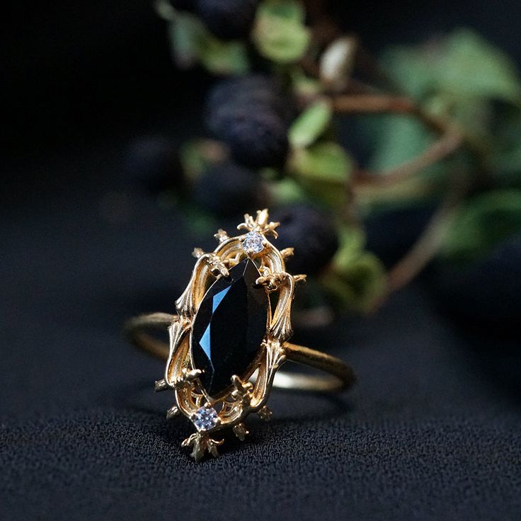 Inspired by Milan Cathedral, this ring is adorned with a natural marquise black onyx and embellished with natural white diamonds. Handcrafted in 14K gold and 18K gold. 14K or 18K solid gold 10*5mm Natural black Onyx Natural round diamonds. 0.02ct. SI clarity, GH color 1.4mm ring band ** This item is specially made for you. Please allow 1-2 week lead time. Shipping:Domestic: Free standard shipping within the U.S.International: Free standard shipping for orders over $200Customization:- Interested Goth Engagement Rings, Milan Cathedral, Gothic Engagement Ring, Onyx Engagement Ring, Cute Engagement Rings, Gothic Rings, Dope Jewelry, Black Diamond Ring, Dream Engagement Rings