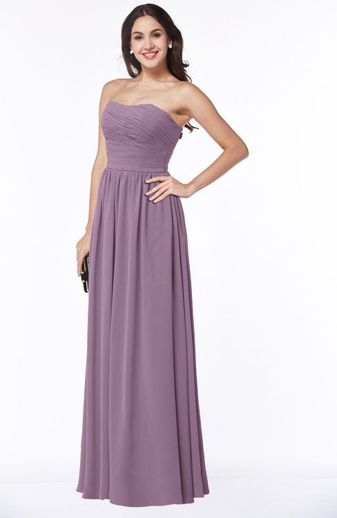 a woman in a strapless purple dress