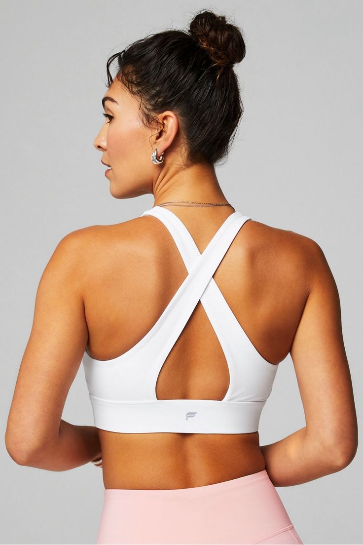 Oasis Twist Medium Impact Sports Bra Fabletics white female Activewear >> Womens >> Sports Bras >> Medium Impact regular Yoga and Studio All-Way Stretch/Moisture-Wicking/Removable Bra Cups Our most flattering, medium-impact bra White Yoga Sports Bra With Built-in Padding, White Sports Bra With Built-in Padding For Workout, Fitted White Activewear With Built-in Padding, White Activewear With Built-in Padding For Gym, White Supportive Activewear For Light Sports, Supportive White Sports Bra With Built-in Padding, Functional White Sports Bra For Workout, Sporty Supportive White Activewear, Functional White Activewear For Workout