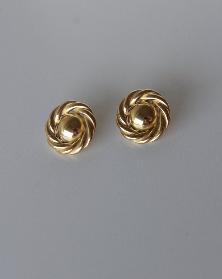 Made from high-quality stainless steel, these earrings boast durability and a lustrous shine that stands the test of time. Their vintage-inspired design adds a touch of old-world charm to any ensemble, making them a versatile accessory for both casual and formal occasions. Timeless Polished Earrings For Formal Occasions, Elegant Tarnish Resistant Metal Clip-on Earrings, Classic Metal Earrings For Everyday, Classic Everyday Metal Earrings, Elegant Everyday Clip-on Earrings, Formal Brass Plug Earrings, Vintage Formal Clip-on Earrings With Polished Finish, Classic Polished Earrings For Anniversary, Classic Polished Finish Earrings For Anniversary