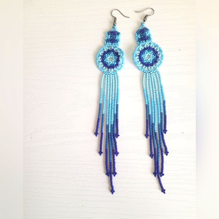 Beautiful One Of A Kind Detailed Beaded Earrings. Southwestern/Native Style. Great For Festivals! These Were Traditionally Made In A Village In Ecuador. Blue Beaded Fringe Earrings For Festival, Bohemian Blue Earrings With Beaded Fringe, Adjustable Blue Bohemian Earrings, Traditional Blue Beaded Fringe Earrings, Bohemian Blue Beaded Round Earrings, Blue Bohemian Beaded Dangle Earrings, Blue Bohemian Beaded Round Earrings, Bohemian Blue Round Beaded Earrings, Blue Southwestern Style Jewelry For Summer