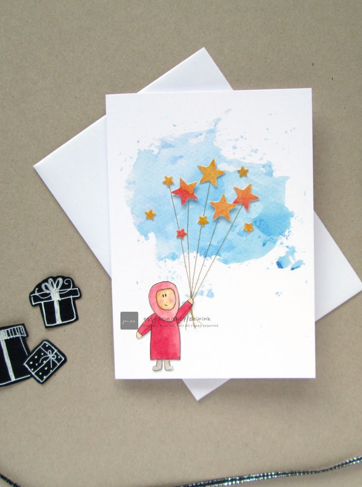 a card with a drawing of a person holding stars