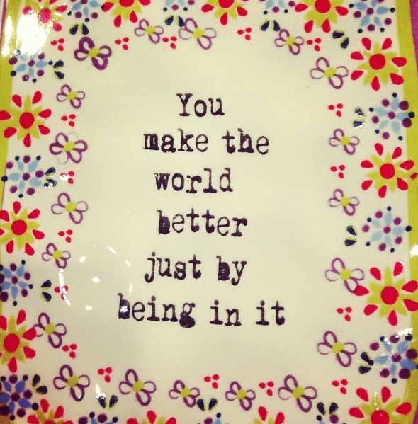 a decorative plate with the words you make the world better just by being in it