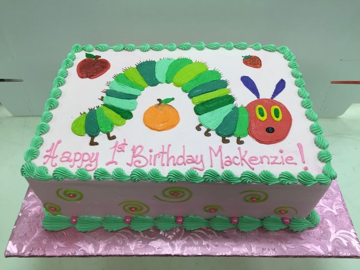 the very hungry caterpillar birthday cake is ready to be eaten