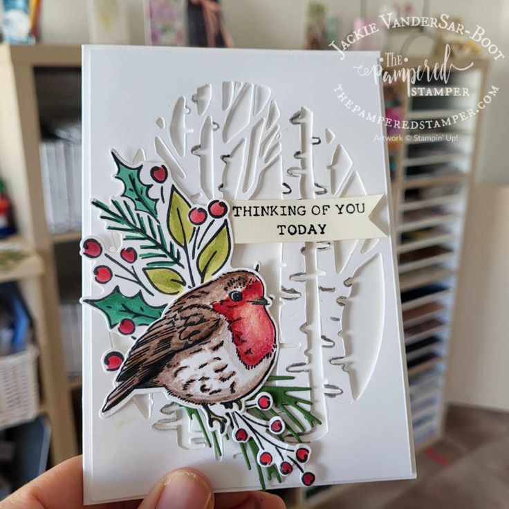 someone is holding up a card with a bird on it and the words, thinking about you today