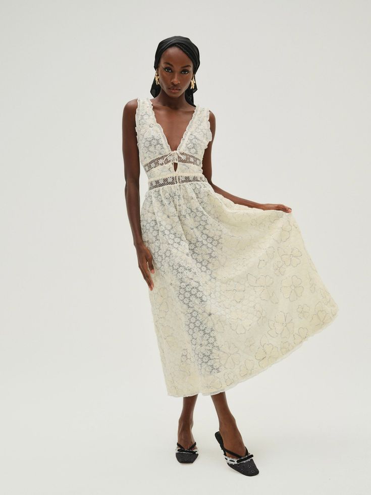 The Snowflake daisy cream midi dress makes an ethereal statement. Featuring a plunging neckline, this embroidered dress spotlights lace trims, chiffon ruffles, and a functional bow at the neckline. Cream Midi Dress, Lace Trims, Wedding Lingerie, Chiffon Ruffle, Cream Dress, Plunging Neckline, Embroidered Dress, For Love, Autumn Winter Fashion