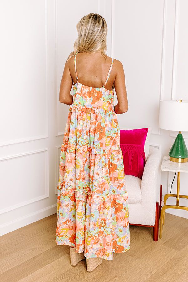 - Step out in this vibrant dress! - Material with a colorful abstract floral print - A v-cut neckline - An elastic back detail - Adjustable spaghetti straps - A built-in bust lining - Ruffle detailing - A flowy yet flattering silhouette that ends in a maxi length hemline Measurements S : Bust 34", Hip 52", Length 46", Waist 44". M : Bust 36", Hip 54", Length 47", Waist 46". L : Bust 38", Hip 56", Length 47", Waist 48". Orange Spaghetti Strap Summer Maxi Dress, Orange Sundress With Adjustable Straps For Spring, Orange Sundress With Adjustable Straps For The Beach, Vibrant Orange Floral Print Maxi Dress, Orange Vacation Dress With Adjustable Straps, Orange Floral Spaghetti Strap Dress, Vibrant Floral Print Sundress For Spring, Orange Spaghetti Strap Lined Dress, Orange Floral Print Dress With Spaghetti Straps