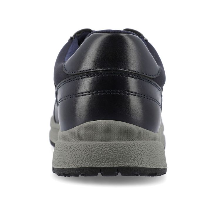 The Thomas sneaker from Vance Co. introduces a perfect blend of style and comfort, featuring a 1-inch sole, lace-up closure, and a classic round toe design. Crafted from a combination of faux leather and fabric this style offers a versatile and contemporary option for casual wear. The fabric lining, 6 mm Tru Comfort Foam™ footbed, and rubber outer sole ensure breathability, comfort, and support, making the Thomas sneaker a trendy and comfortable choice for everyday activities. Classic Navy Sneakers With Contrast Sole, Navy Leather Lace-up Sneakers, Classic Navy Sneakers With Round Toe, Navy Sneakers With Rubber Sole And Round Toe, Navy Sneakers With Contrast Sole And Round Toe, Navy Sneakers With Contrast Sole, Navy Lace-up Sneakers With Rubber Sole, Navy Lace-up Sneakers With Contrast Sole, Modern Navy Sneakers With Round Toe