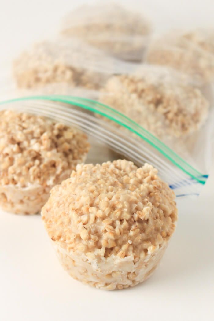 three oatmeal muffins sitting on top of each other in plastic bags