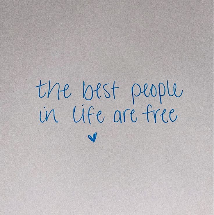 a white wall with blue writing on it that says the best people in life are free