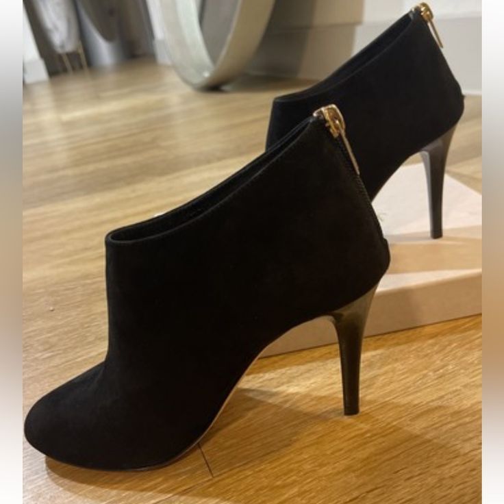 Or Best Offer Jimmy Choo Suede Ankle Boot. 3 1/2" Lacquered Heel. 3 1/4"H Ankle Shaft. Almond Toe. Back Zip For Ease Of Dress. Leather Lining And Padded Insole. Leather Sole With Rubber Inset. "Mendez" Is Made In Italy. New. Never Worn. Elegant Suede Heeled Boots With 4-inch Heel, Formal Almond Toe Heeled Boots With 4-inch Heel, Chic Ankle Strap Heeled Boots With 4-inch Heel, Chic Heeled Boots With Ankle Strap And 4-inch Heel, Chic Boots With Reinforced Heel For Galas, Elegant Pointed Toe Booties, Elegant Almond Toe Boots With Heel Tab, Elegant Medium Width Booties For Work, Luxury Ankle-high Boots With 4-inch Heel