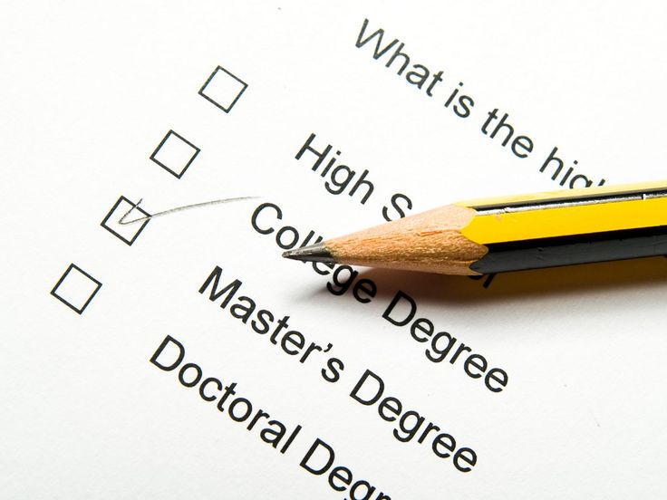 a pencil sitting on top of a piece of paper with the words college degree written in it