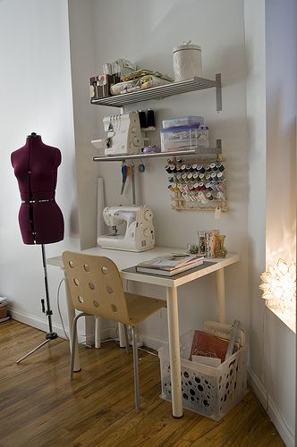 a sewing studio with mannequins and crafting supplies