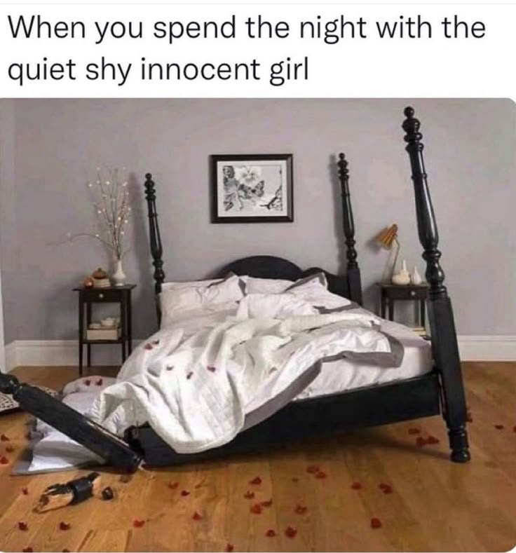 a bed that is in the middle of a room