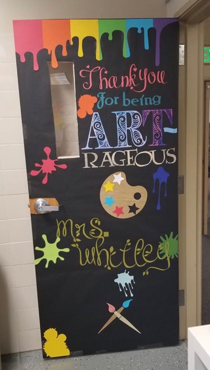 the door to an art class is decorated with chalk paint and acrylic colors