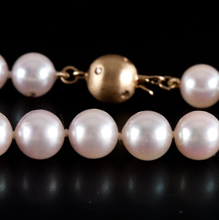 14k Yellow Gold Cultured Round Pearl Necklace W/ Diamond Accent Clasp .03ctwMetal Information: 14k Yellow GoldTotal Weight: 30.2gNecklace Width: 7.5mmNecklace Length: 15"Stone InformationMain StoneGem Type: PearlShape: Round (7.5mm - 7.0mm)Color: WhiteClarity/Quality: AANumber of Stones: 54Accent StoneGem Type: DiamondShape: Round (1.0mm)Color: HClarity/Quality: SI1Carat Weight: .005ctNumber of Stones: 6Total estimated ctw (carat total weight): .03ctwEstimated Retail Price: $1505.00OUR PRICE: $1 Pearl Necklace, Pearl Earrings, Yellow Gold, Stone, Yellow, Gold, Color