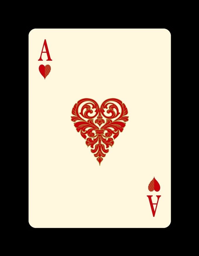 a red and white playing card with two hearts on the front, and one in the middle