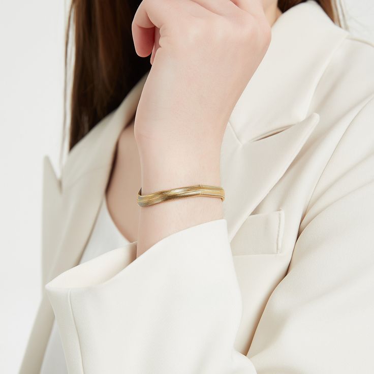 Statement chunky snake style gold bracelet. This bracelet is a perfect statement piece. You can wear it alone or layer it with other gold bracelets. A perfect addition to your jewelry collection! ………………………………….D E T A I L S• Materials: Stainless steel, 18k gold plating.• Length: 6 inches (15 cm) + extension 1.9 inches (5 cm)• Width: 5 mm• This product is hypoallergenic, water and tarnish resistant Gold Plated Elegant Snake Chain Bracelet, Elegant Gold Plated Snake Chain Bracelet, Elegant Gold-plated Snake Chain Bracelet, Elegant Everyday Gold-tone Bangle, Chic Yellow Gold Bracelet, Elegant Gold Snake Chain Bracelet For Everyday, Elegant Gold Snake Chain Bracelets, Elegant Gold Bracelet With Snake Chain, Elegant Everyday Gold Snake Chain Bracelet