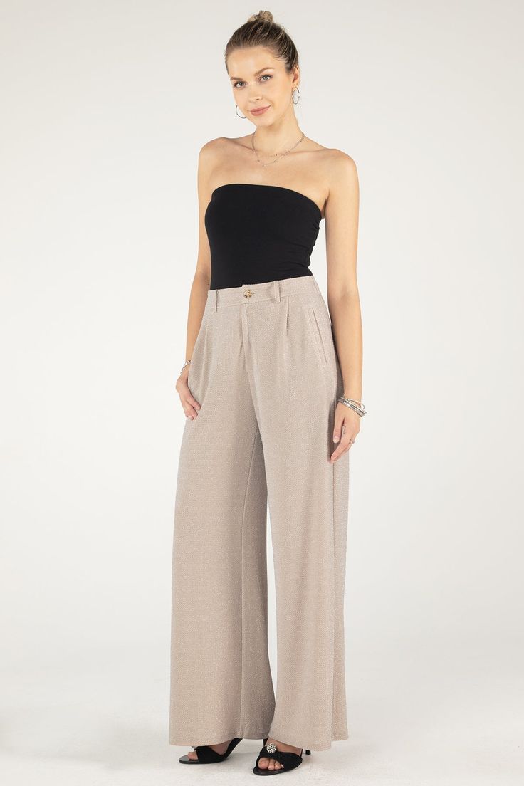 High-rise, wide leg pants with glitter detailing- Faux back pockets- Elastic waistband- Zip up fly- 2 side pockets- Non-lined Model is wearing size: SModel MeasurementsHeight: 5'9"Bust: 34"Waist: 24"Hips: 34" Fabric Content: Self: 68.5% Nylon, 25.5% Metallic, 6% Spandex; Lining 100% PolyesterCare: Gentle hand wash cold. Lay flat to dry. Do not bleach nor iron.Style No. MP0174L-NUDEBEIG Business Casual Wide-leg Pants With Side Pockets, Business Casual Wide Leg Leather Pants, Wide-leg Dress Pants With Elastic Waistband For Fall, Fall Wide-leg Dress Pants With Elastic Waistband, Business Casual Wide Leg Bottoms, Fall Dress Pants With Elastic Waistband And Wide-leg, Wide Leg Pants With Elastic Waistband For Business Casual, Business Casual High-waisted Wide Leg Pants With Elastic Waistband, Formal Wide Leg Pants With Side Pockets