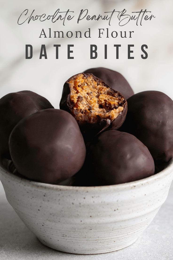 chocolate peanut butter almond floured date bites in a white bowl with text overlay