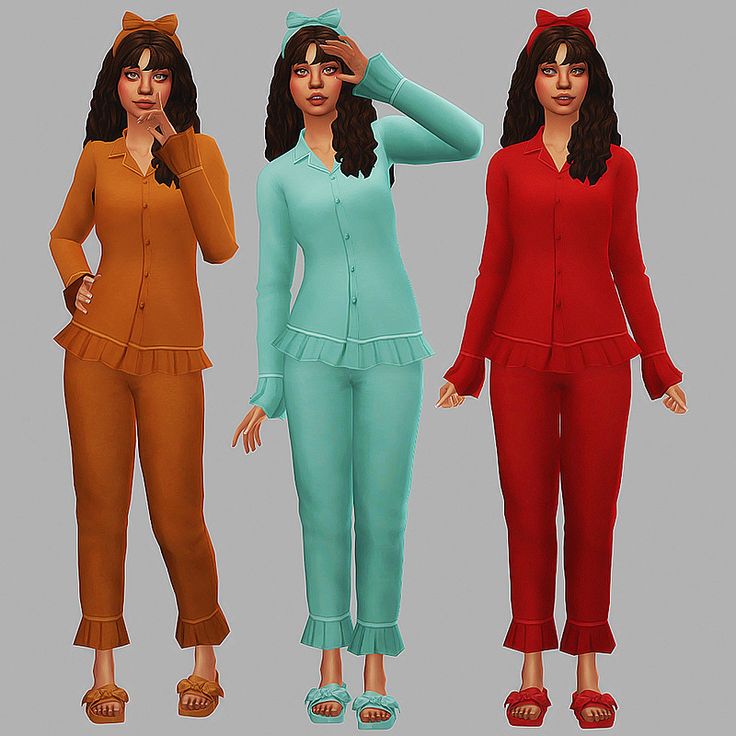 three women in different colored outfits standing next to each other with their hands on their head