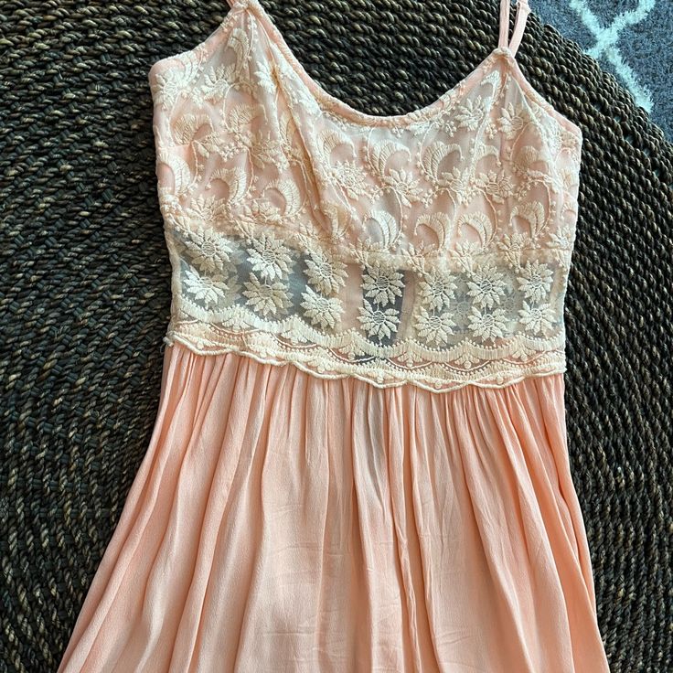 Topshop Pink Flowy Spaghetti Strapped Sundress Upper Portion Is Lacey With A Peek-A-Boo Cut Out At The Middle The Skirt Portion Is Pleated/Flowy Solid Pink This Dress Has Not Been Worn Brand New Without Tags Size 4 Spring Cami Slip Dress, Spring Cami Slip Dress With Lace Trim, Sleeveless Lace Trim Slip Dress For Vacation, Casual Spring Slip Dress With Delicate Straps, Casual Slip Dress With Delicate Straps For Spring, Spring Peach Dress With Spaghetti Straps, Summer Cami Mini Dress With Lace Trim, Summer Cami Slip Dress With Lace Trim, Cami Beach Dress With Delicate Straps