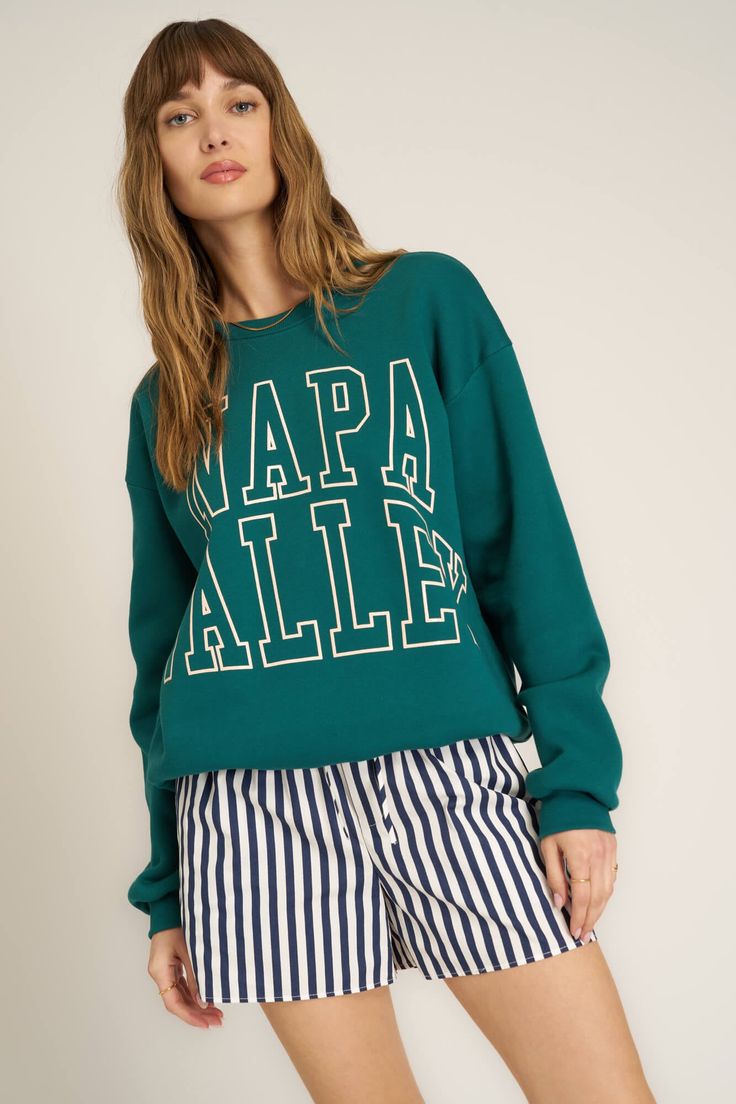 Napa Valley Arch Sweatshirt in Pacific Teal Sporty Graphic Print Tops For The Weekend, Sporty Letter Print Tops For Weekend, Sporty Cotton Tops With Letter Print For Weekend, Sporty Weekend Tops With Letter Print, Sporty Tops With Letter Print For Weekend, Casual Screen Print Sweatshirt For Fall, Casual Sweatshirt With Screen Print For Fall, Casual Fall Sweatshirt With Screen Print, Collegiate Sweater For Loungewear In Fall