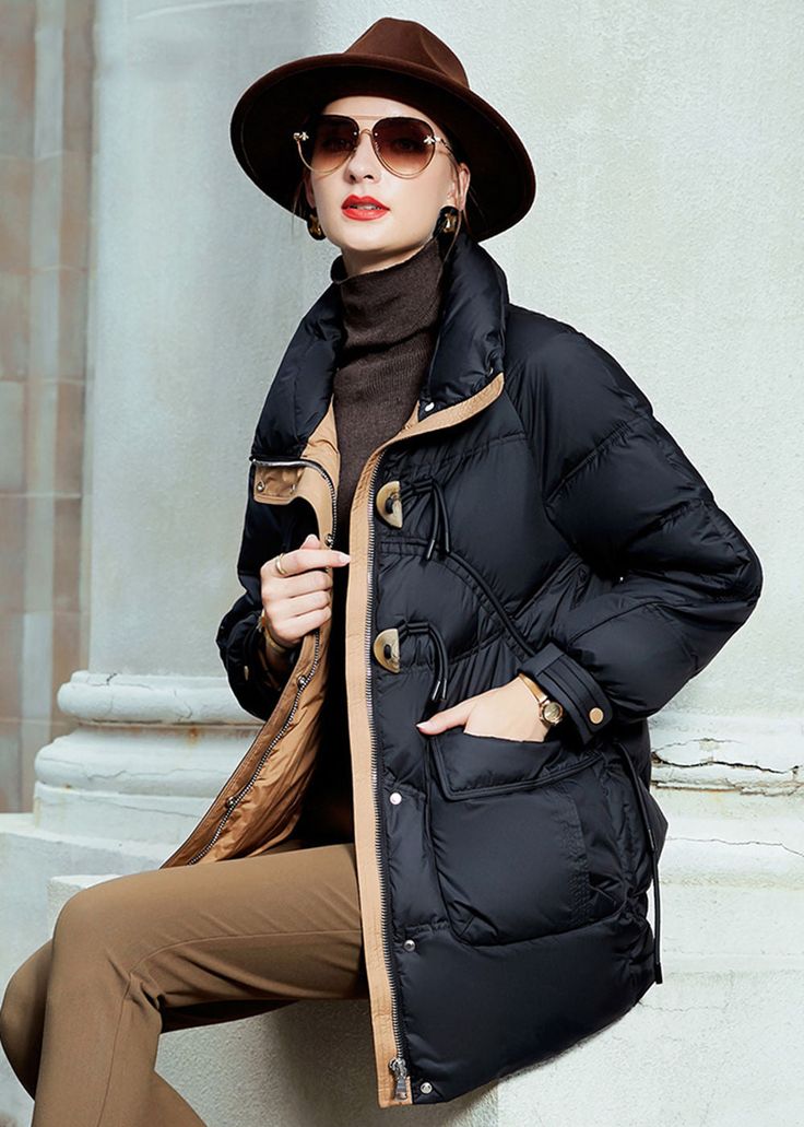 Our luxurious duck-down jacket will have you looking chic and feeling comfortably cozy through winter. Crafted from plush white duck down, your jacket can be worn dressed up or dressed down with its classic silhouette that is sure to flatter any figure. You'll be sure to stay warm and stylish in this timeless staple.Details & care Stand collar Front toggle and button closure Hidden front zip closure with snap storm placket Lined, with 90% duck down, 10% feather fill Polyester Dry clean Women's c Winter Duck Down Outerwear With Padded Collar, Duck Down Puffer Jacket With Padded Collar, Luxury Duck Down Outerwear With Padded Collar, Fall Duck Down Puffer Jacket With Pockets, Luxury Duck Down Puffer Jacket For Cold Weather, Winter Duck Down Puffer Jacket With Padded Collar, Fall Duck Down Puffer Jacket, Classic Winter Down Outerwear, Luxury Down Quilted Jacket For Winter