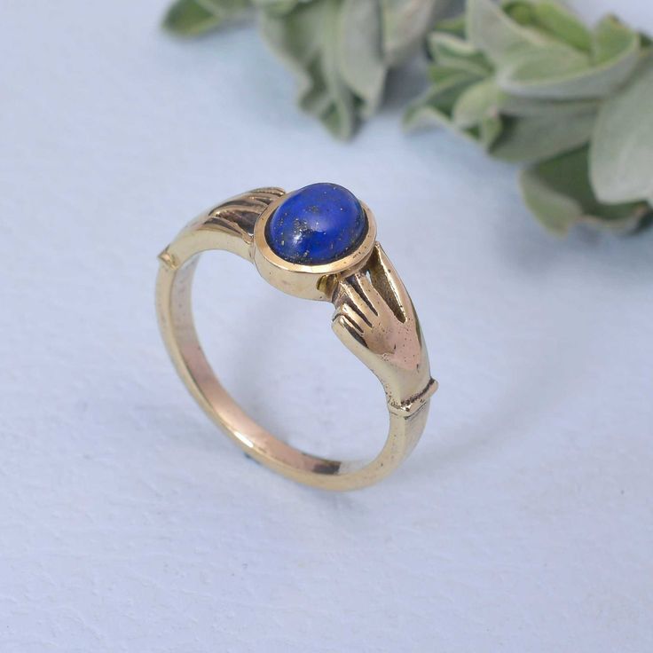 Hugging Design Lapis Lazuli Oval stone Ring, Gold Hug Ring, 925 Sterling Silver Ring, Lapis Gemstone jewelry, 14K Gold Ring, Gift Ring, Boho Enjoy Free Shipping on All Orders Product Description:-    *Handmade item *Dispatches from a small business in India *Materials         :-   Brass, 925 sterling Silver *Band colour    :-   Gold, Silver *Style                 :-   Boho & hippie *Can be personalized PRODUCT CODE     :-        Ring SIZE           :-       All Size Are Available. Choose From Va 14k Gold Rings With Natural Stones For Gift, Oval Brass Rings Fine Jewelry, Gold Sterling Silver Rings With Natural Stones, Handmade 14k Gold Oval Cabochon Jewelry, Handmade 14k Gold Oval Rings, Yellow Gold 14k Rings With Natural Stones, Oval Brass Promise Ring, Oval Brass Rings For Anniversary, Oval Lapis Lazuli Ring For Anniversary