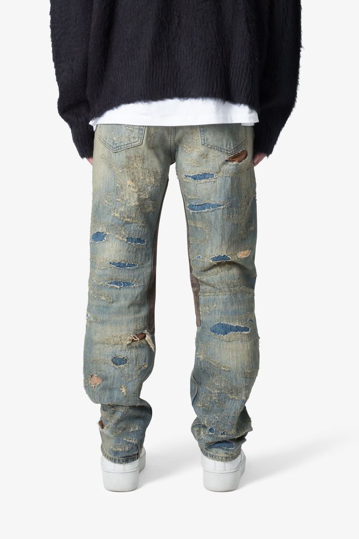 the V613 Distressed Saddle Denim is designed with our updated V fit which is more relaxed throughout than our initial V fit, featuring a vintage wash with whiskering details throughout, constructed from 100% cotton denim, contrasting panelling at the inseam, and finished with distressing and repair details throughout. details relaxed fit throughout* 100% cotton extended inseam model is 6’1, 140 lbs and wears a size 30 *note: this style is not constructed with stretch or spandex Distressed Medium Wash Rigid Denim Jeans, Ripped Medium Wash Rigid Denim Jeans, Ripped Jeans In Medium Wash Rigid Denim, Medium Wash Distressed Denim Jeans, Urban Distressed Cotton Jeans, Ripped Dark Wash Rigid Denim Jeans, Medium Wash Distressed Straight Leg Jeans, Pre-washed Recycled Denim Blue Jeans, Distressed Denim Jeans For Streetwear