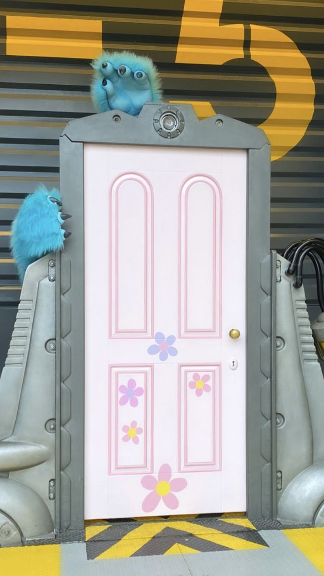 an image of a door that is painted pink and grey