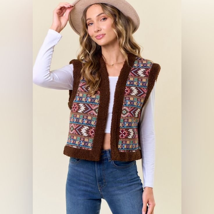 Embriodery Vest With A Sherpa Lining Brown Color Fabric Contents: 100% Acrylic Embroidered Sleeveless Vest For Fall, Sleeveless Embroidered Vest For Fall, Fall Cotton Embroidered Vest, Fall Embroidered Cotton Vest, Bohemian Sleeveless Winter Tops, Bohemian Brown Vest Top, Bohemian Vest Tops For Fall, Embroidered Sleeveless Outerwear For Winter, Color Fabric