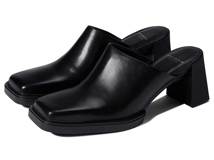 Vagabond Shoemakers Edwina - Women's Shoes : Black : Ace the formal wear by accessorizing with the classy and elegant Vagabond Shoemakers Edwina mules. Vagabond recommends sizing up if you are in between sizes. Leather upper, lining, and insole. Slide-in style. Square toe and block heel. Man-made outsole. Imported. Measurements: Heel Height: 3 in Weight: 12.95 oz Product measurements were taken using size EU 39 (US Women's 9), width M. Please note that measurements may vary by size. Weight of fo Sleek Formal Mules With Closed Toe, Formal Slip-on Clogs With Reinforced Heel, Formal Mules With Reinforced Heel, Formal Mules With Reinforced Open Heel, Formal Open Heel Mules With Reinforced Heel, High Heel Mules With Removable Insole For Work, Classic Stacked Heel Mules For Office, Formal Closed Toe Mules With Sculpted Heel, Classic Office Mules With Stacked Heel