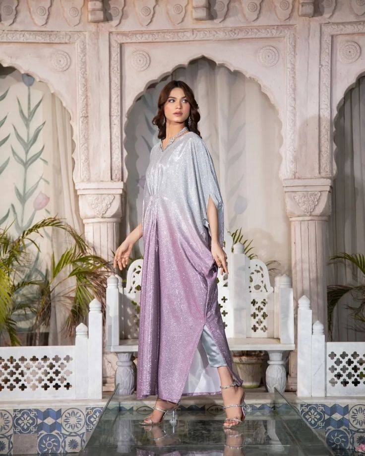 The MOONLIGHT - 2 Piece Kaftan is a must-have for any formal occasion. With its blingy design and sequence fabric, this kaftan is perfect for adding a touch of glamour to your evening look. Plus, it's perfect for night photography, making it a versatile and stylish choice. Fabric: Moonlight Includes: Kaftan and trousers  Length: 52"-53" Model's height: 5'8 ***PLACE YOUR PRE-ORDERS BY 29TH MARCH 2024 FOR GUARANTEED DELIVERY BY EID*** #readytowear #Pakistaniwedding #Pakistanibride #Moder... Kaftan Party Wear, Moonlight Dress Design Pakistani, New Kaftan Designs, Pakistani Bridesmaid Dresses, Latest Kaftan Designs, Kaftan Dress Modern, Pakistani Bridesmaids, Sequence Fabric, Dress Design Pakistani