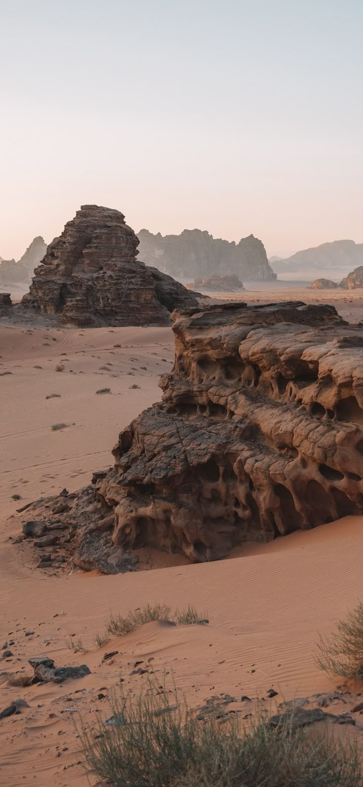 some rocks in the middle of a desert